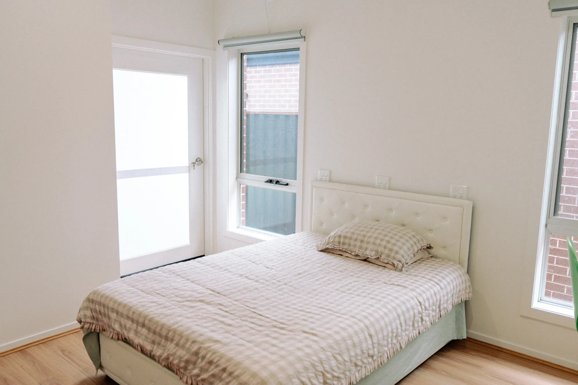 A light-filled bedroom with garden access in a MY DSP home