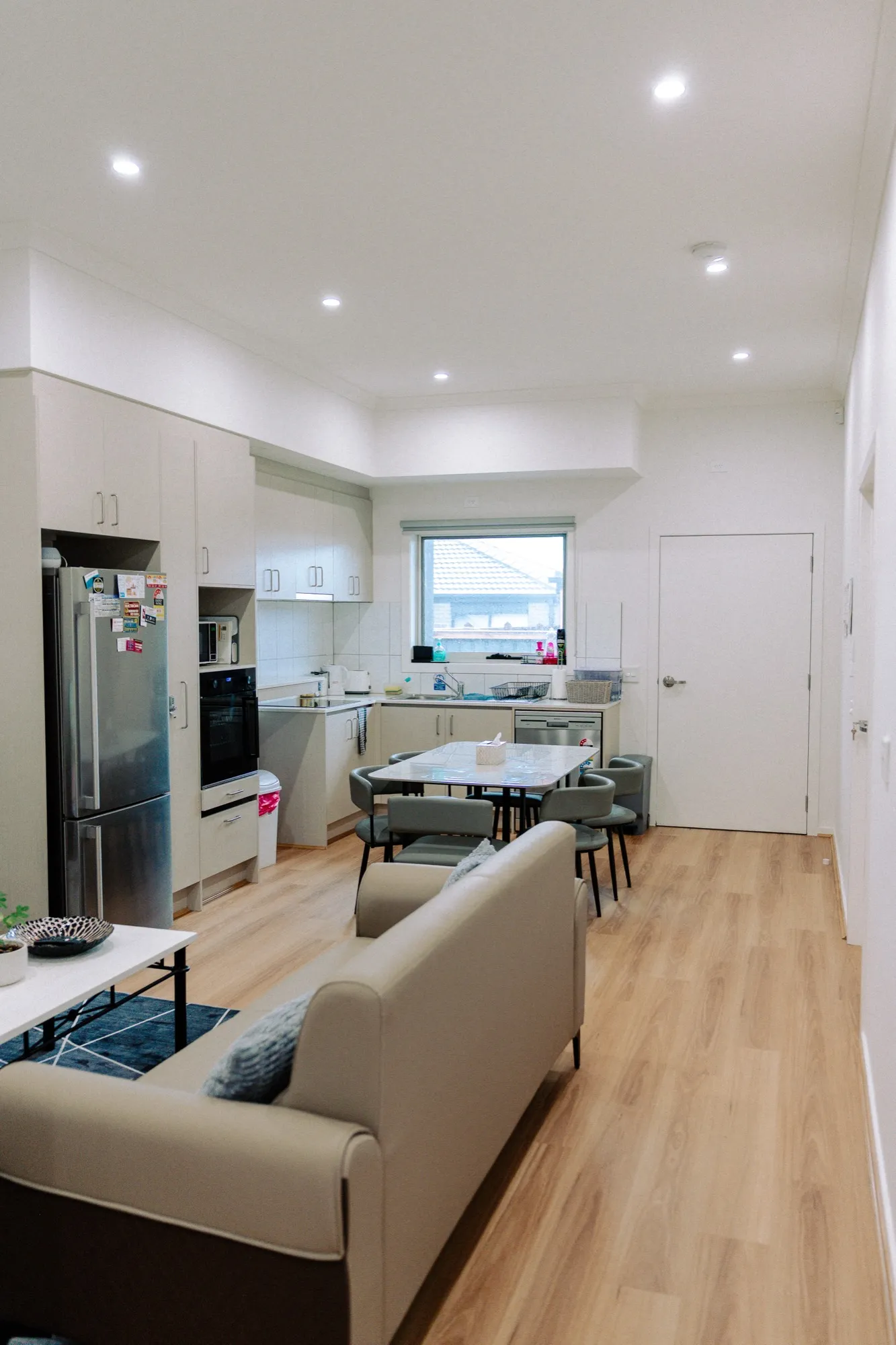 Open-plan living room and kitchen in a MY DSP Supported Independent Living home